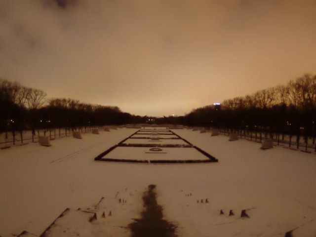 Snowglowing over a park