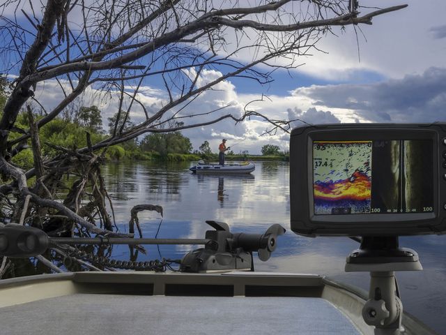 Screen attached to a fishing boat showing thermal imaging.